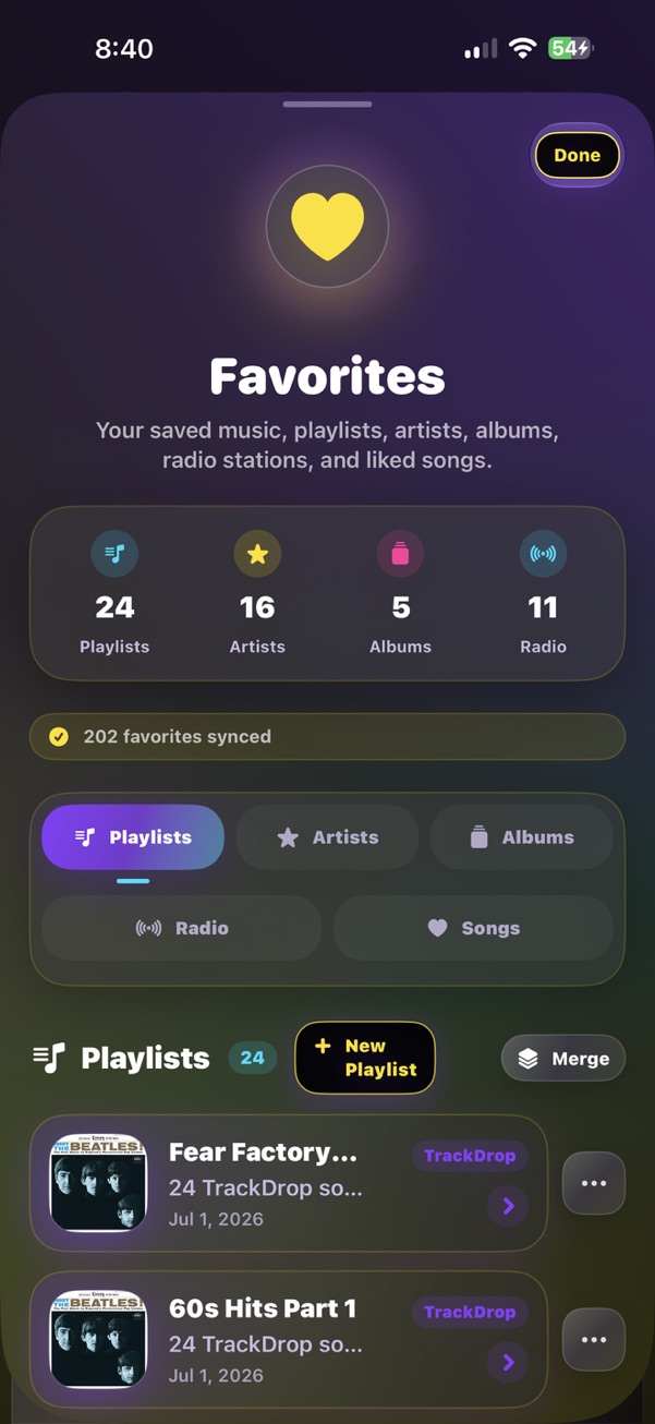 TrackDrop favorites screen with playlists and albums